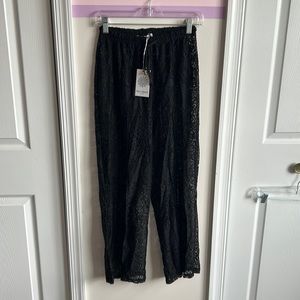 Women’s brand new with tags crochet with slit cover up pants